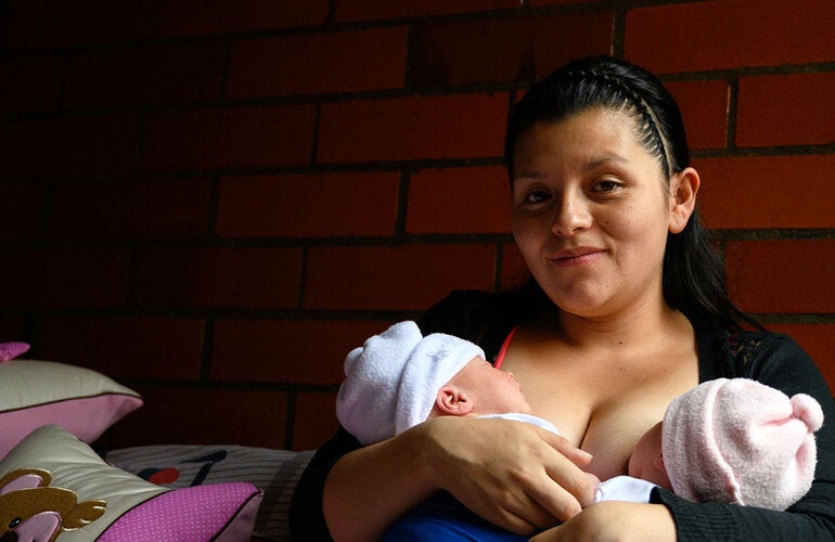 Mother holding twins