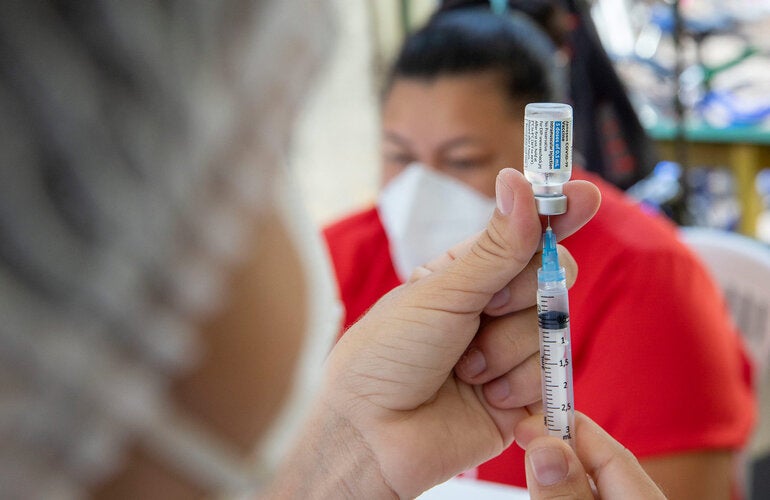 Woman is being vaccinated against COVID-19