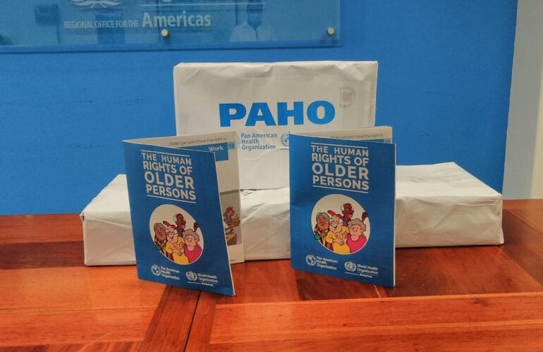 Booklets and Posters handed over to the NDACC and NCA of Belize