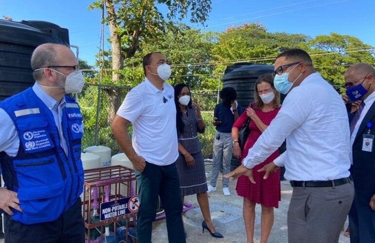 Guided by Mr. Garfield Wood from design and inspection firm GW Architects, Jamaica’s Minister of State, Ministry of Finance & the Public Services, Member of Parliament, North East St. Ann, Hon. Marsha Smith, Minister of Health & Wellness, Dr. the Hon. Christopher Tufton, MP, Her Excellency Judith Slater, British High Commissioner to Jamaica and Mr. Ian Stein, PAHO/WHO Representative in Jamaica are touring the St. Ann’s Bay Smart Health Centre as part of the official handover ceremony.