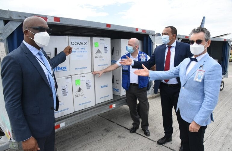 Dr. the Hon. Christopher Tufton, Minister of Health and Wellness, Senator the Hon. Leslie Campbell, State Minister in the Ministry of Foreign Affairs and Foreign Trade, His Excellency Olivier Guyonvarch, Ambassador of the French Republic to Jamaica and Mr. Ian Stein, PAHO/WHO Representative to Jamaica, Bermuda and the Cayman Islands were on hand to witness the arrival of the first shipment at the Norman Manley International Airport in Kingston.