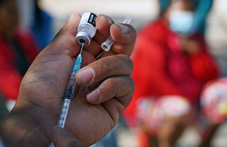 COVID-19 vaccine at hand