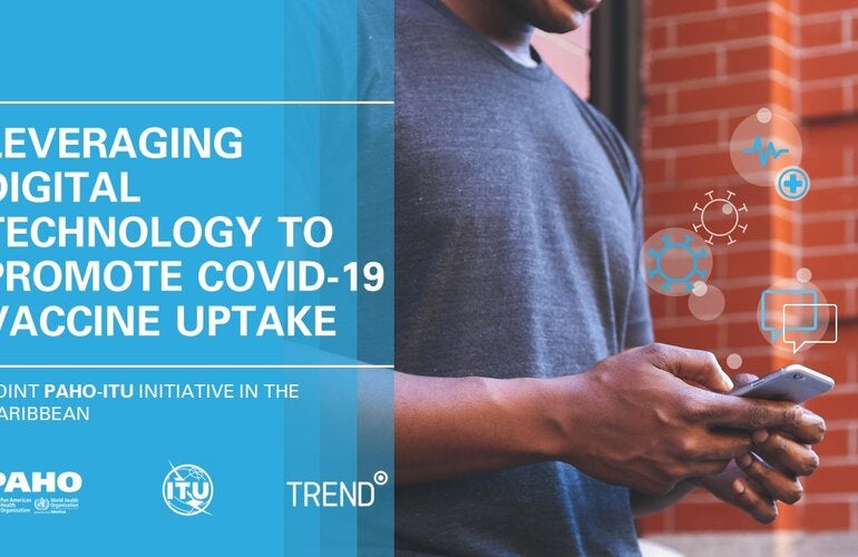 Young man holding mobile phone