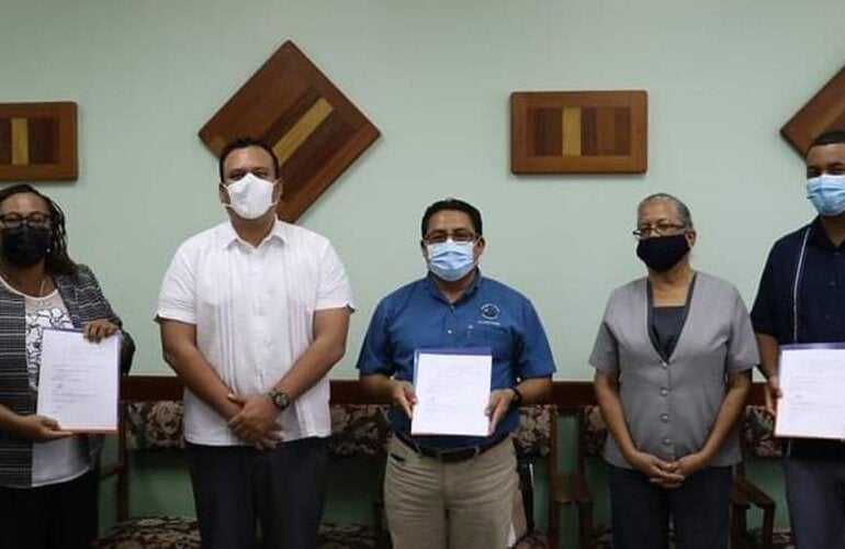 Signing of Mental Health and Psychosocial Consultancy Agreement in Belize. Photo Courtesy of Government Press Office of Belize