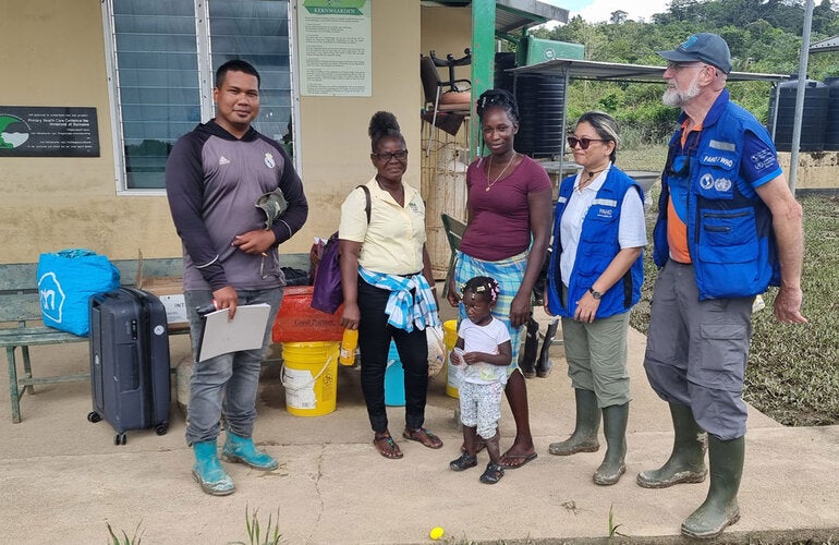 Groups photo with locals in Gakaba