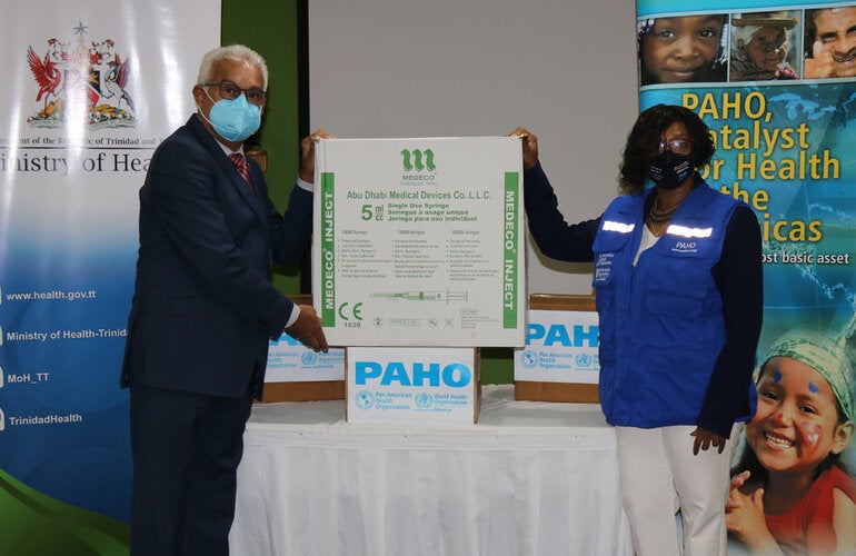 Minister of Health, The Honourable Terrence Deyalsingh and PAHO/WHO Representative, Dr Erica Wheeler 