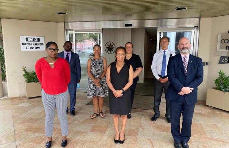 Mr Ian Stein (front right) poses with key members of the Ministry of Health