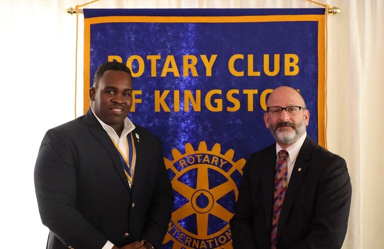 Mr. Ian Stein, Pan American Health Organization/ World Health Organization Representative to Jamaica, Bermuda and the Cayman Islands (right) paused to greet Karsten Johnson, President of the Rotary Club of Kingston after his lunchtime presentation on polio and NCDs