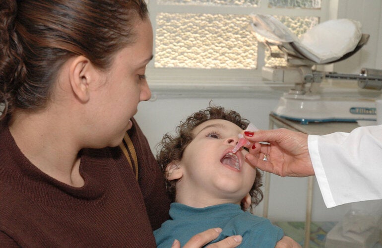 Boy receives polio vaccination