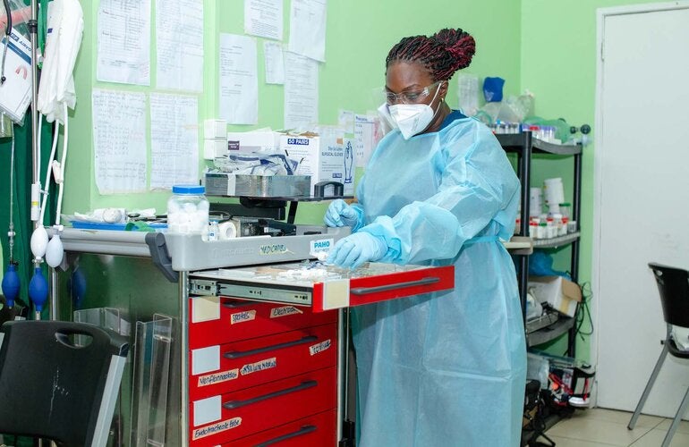 Nurse Samanta Toney working in the COVID-19 Intensive Care Unit in 's Lands Hospital in Suriname.