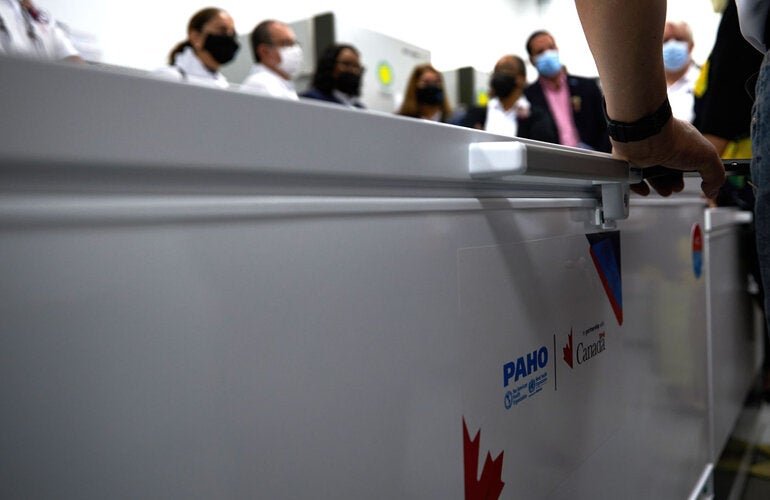 Vaccines are transported in coolers.