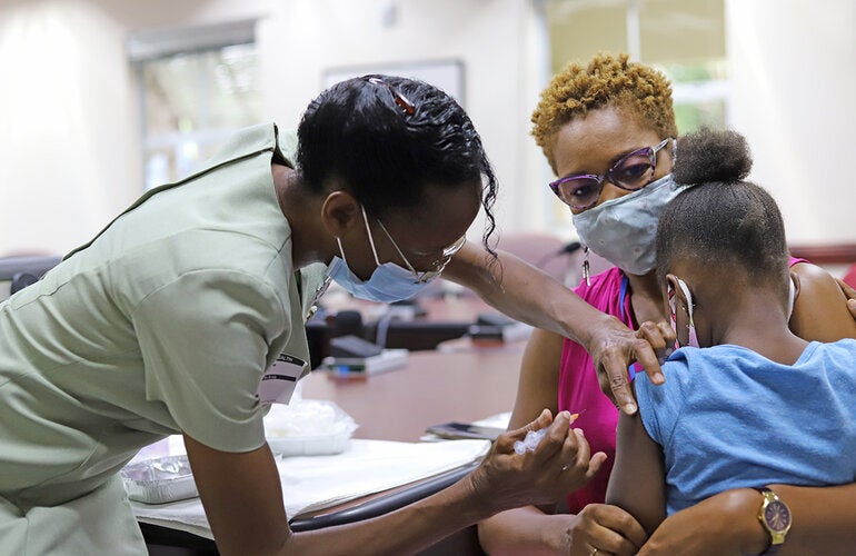 Child being vaccinated