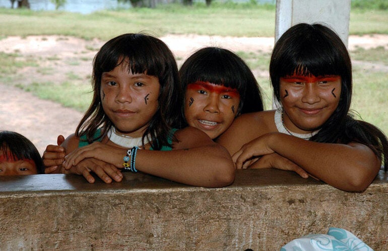 3 indigenous girls smiling