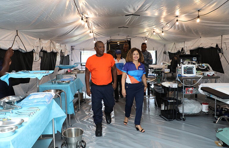 Touring a field medical facility