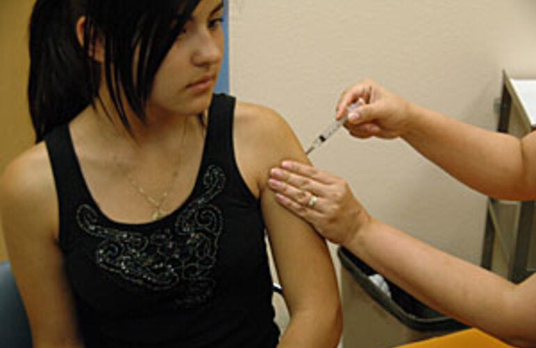 girl receiving vaccine