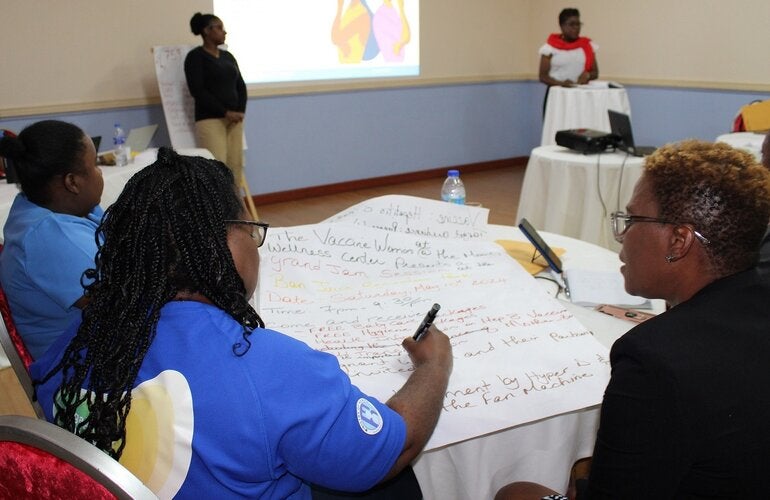 Nurses discussing their RCCE presentation.