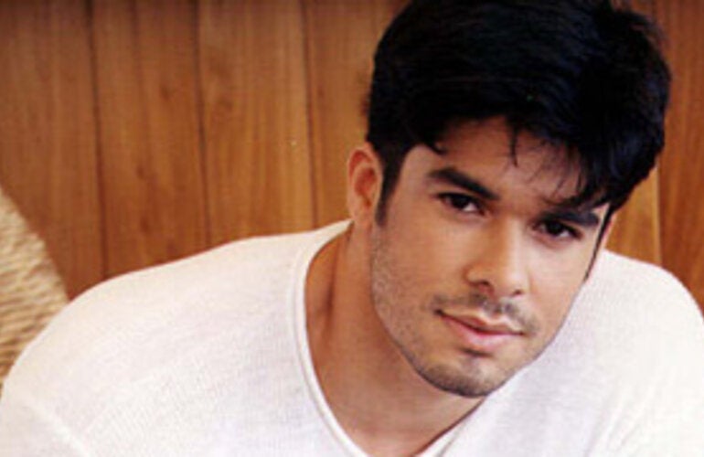 jerry rivera posing for the camera