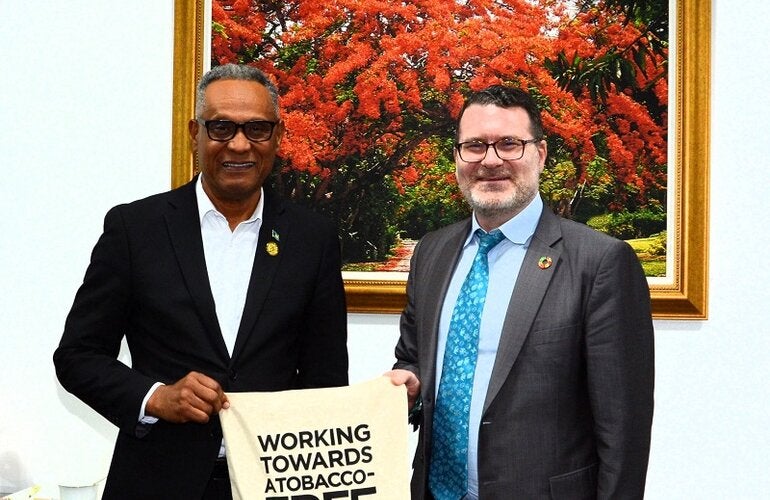 Hon. Michael Darville, Minister of Health and Wellness and WHO FCTC representative meet to discuss the FCTC mission. 