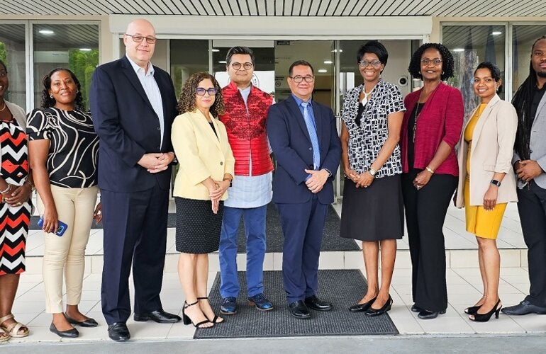 UWI Students, PAHO Heads of office and tutors at the PAHO Barbados Office