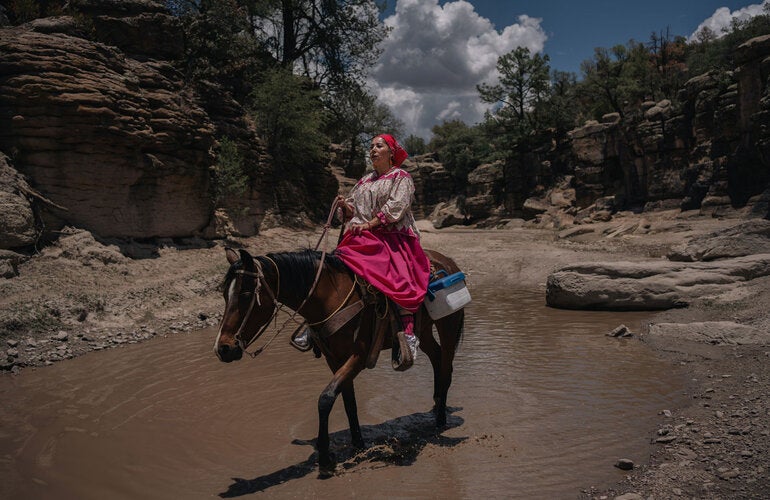 Julia on horse back reaches remote indigenous community to vaccinate 