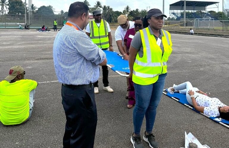 Participants take part in an emergency simulation exercise
