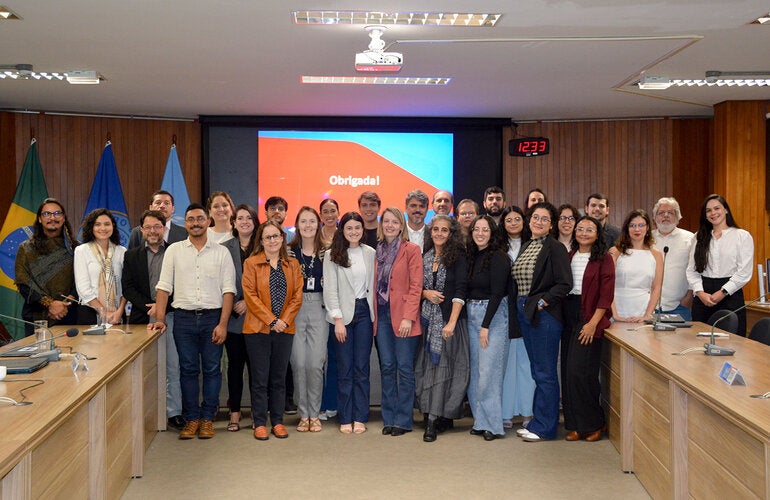 Foto do grupo de pessoas que participaram do evento