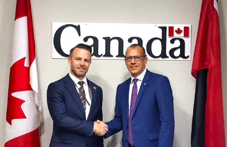 (L_R)  His Excellency Michael Callan - Canadian High Commissioner to Trinidad and Tobago , Dr. Gabriel Vivas Francesconi - PAHO/WHO Representative for Trinidad and Tobago and the Dutch Caribbean Islands