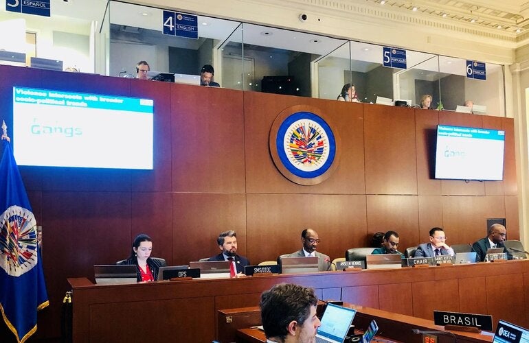 A group of people sitting in a room