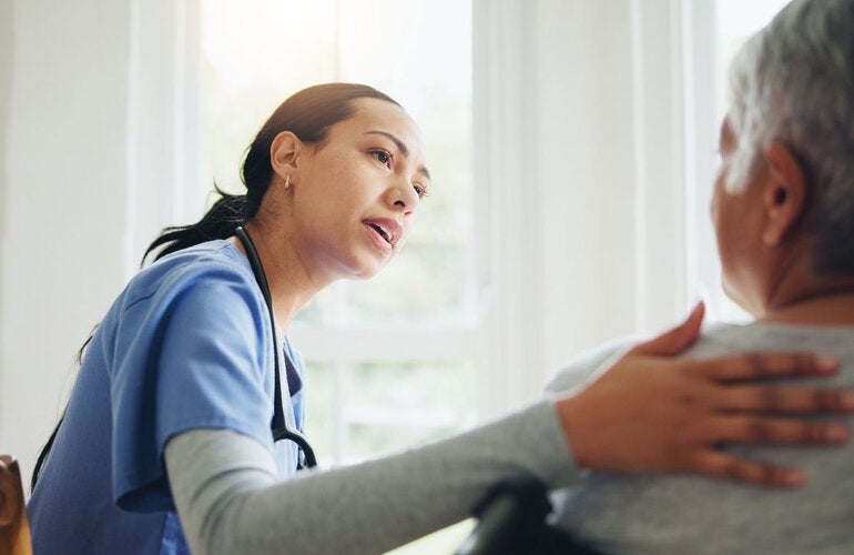 Nurse caring for patient