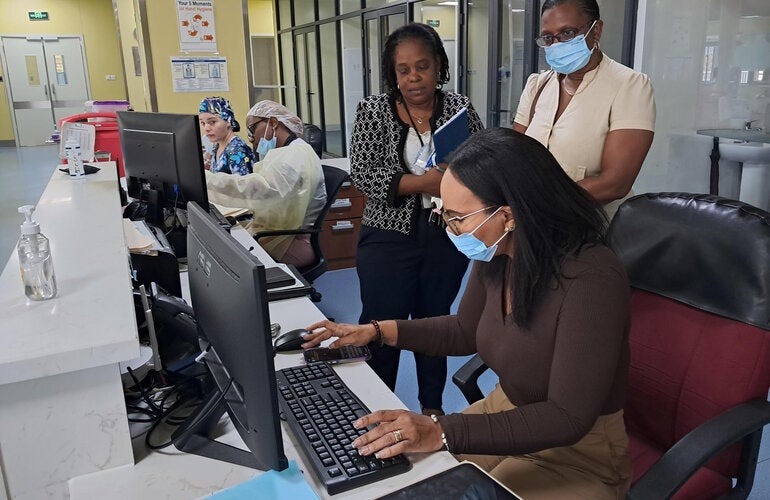 PAHO consultant testing DHIS2 access at the hospital in Dominica