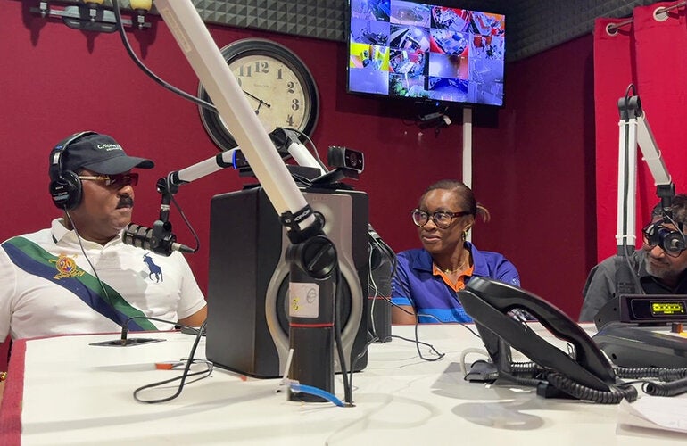 PAHO team at radio show with Prime Minister of Antigua and Barbuda
