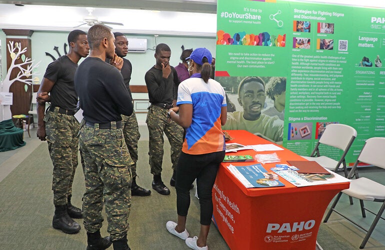 PAHO Advisor interacting with members of the Barbados Defence Force