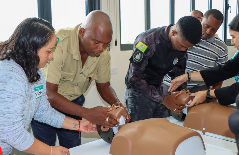 Community First Aid Response (CFAR) Training in Belize with Police Officers