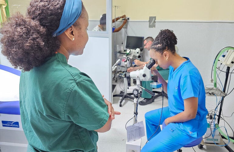 Doctors testing medical equipment