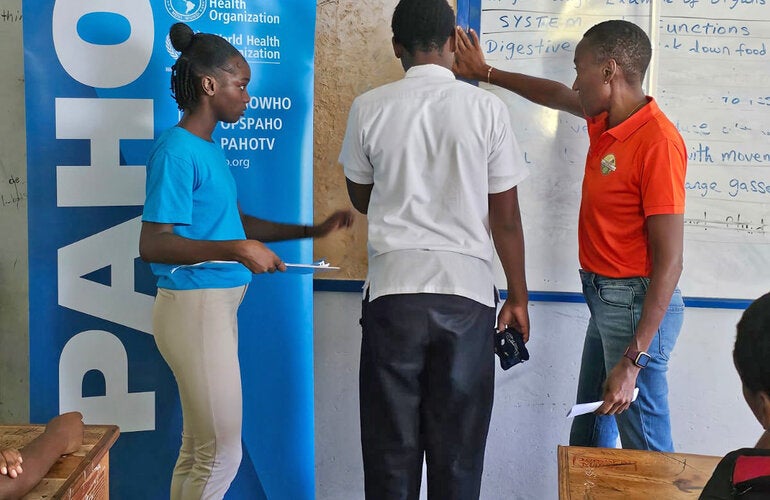Children being weighed at Secondary School