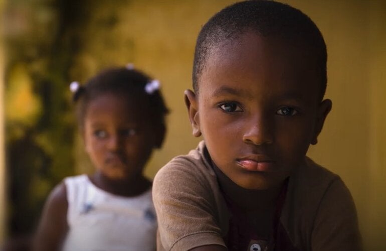 Two children looking at the camera.