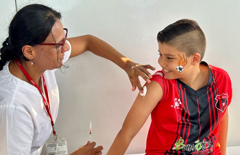 Boy receives vaccine