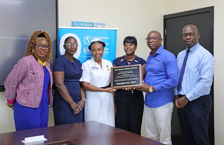 Handover the Baby-Friendly Hospital accreditation plaque to officials in Grenada
