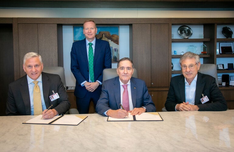 PAHO Director Dr. Jarbas Barbosa and David Ross, Executive Vice President and General Manager, CSL Seqirus signing the agreement.