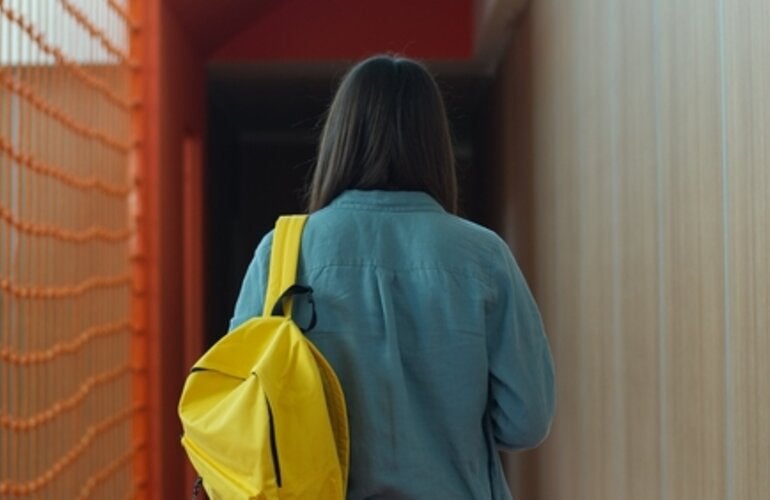 woman walking from behind