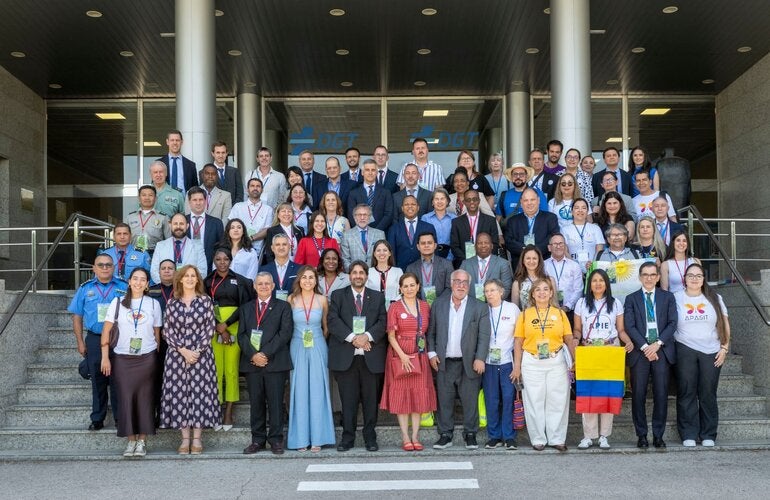 Participants in the OISEVI meeting pose for a group photo on the steps outside the headquarters of Spain’s Directorate-General for Traffic (DGT) in Madrid.