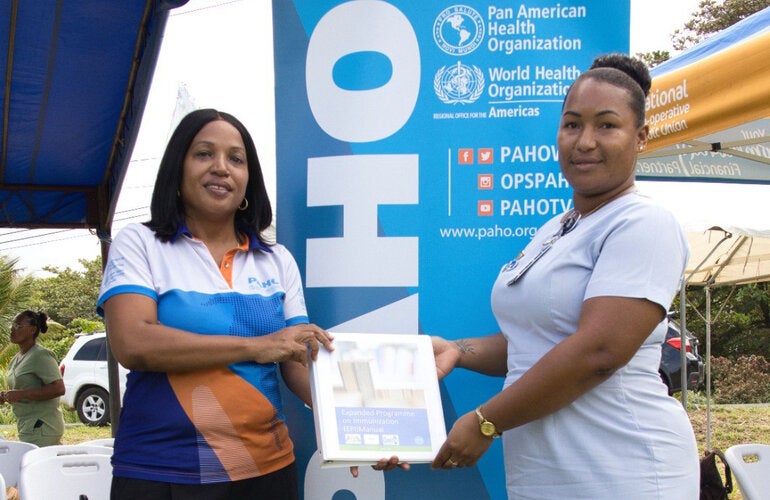 Handing over of manuals in Dominica