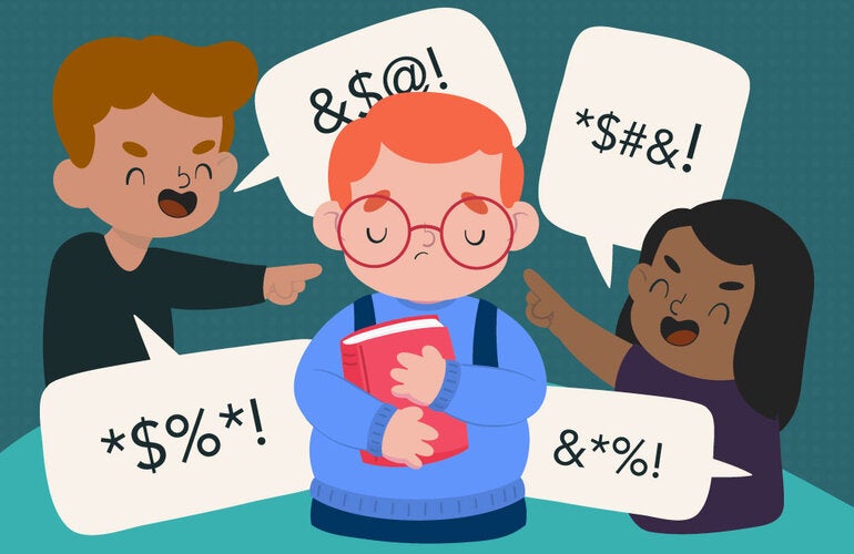 Three young persons bullying one of them