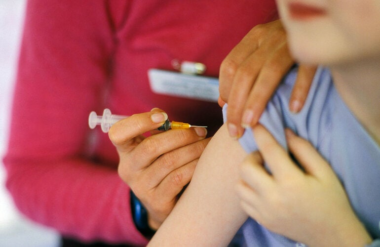 Child gets measles vaccine