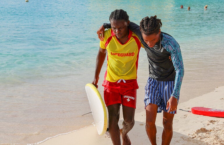 Lifeguard saves person at the beach