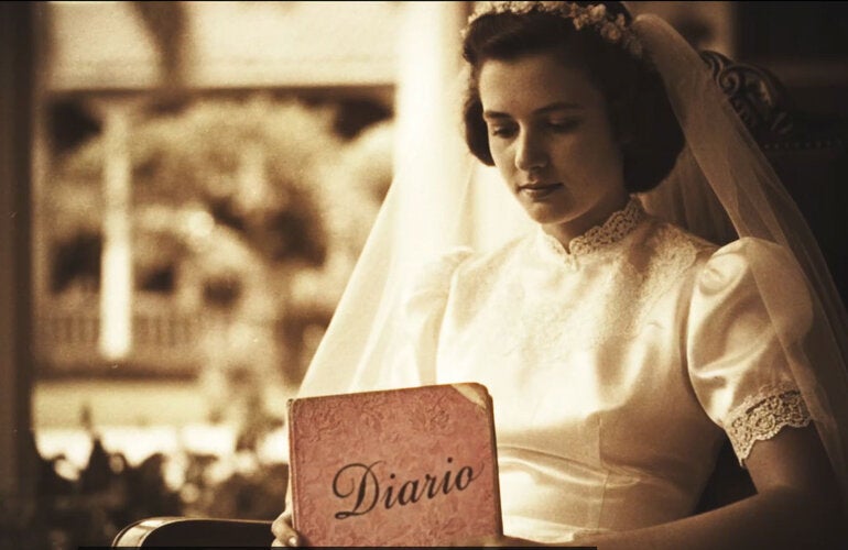 Teenage girl holding her journal