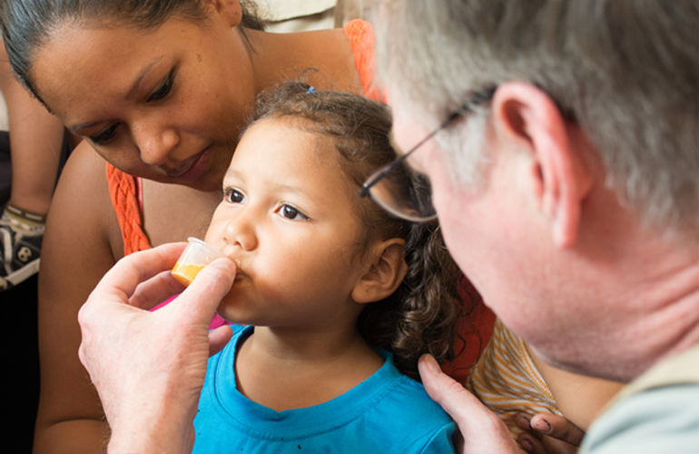 Girl receives medicine