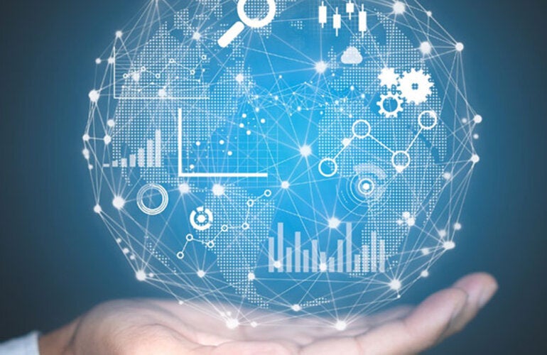 Hand holding globe with data