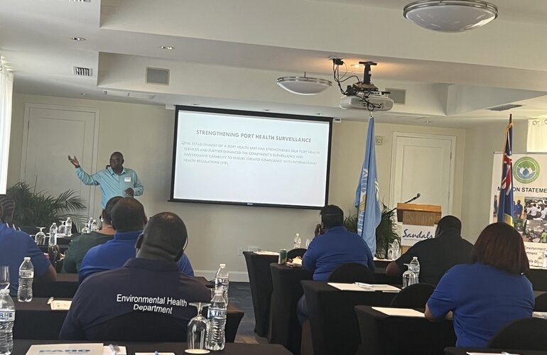 Participants listen attentively to the training. 