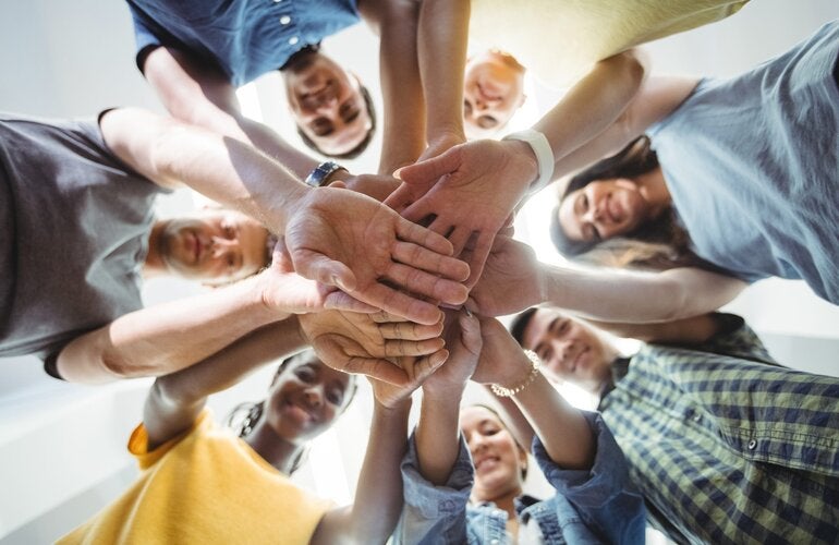 Trabajo en equipo, manos, personas